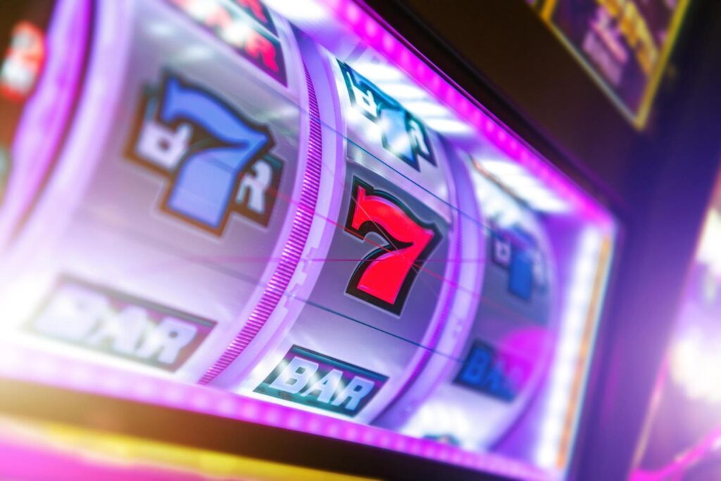casino slot machine with three 7 on the display